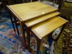 A SET OF THREE G-PLAN TEAK SIDE TABLES, typical design and construction, 49 cms high, 53 cms wide,