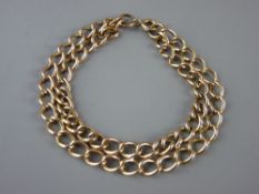 A NINE CARAT GOLD DOUBLE STRAND LINK BRACELET, 19 grms