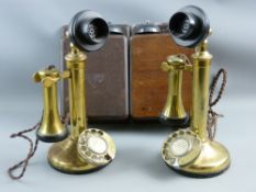 A PAIR OF VINTAGE BRASS & BAKELITE CANDLESTICK TELEPHONES with associated GPO bell boxes, the