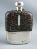 A GENT'S LARGE SILVER HIP FLASK with twist open globular lid and gilt lined removable drink's cup,