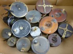 A PARCEL OF FOURTEEN FISHING REELS (five wooden, eight metal and one a Mitchell Cap 304 and metallic