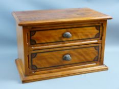 A LATE 19th CENTURY TWO DRAWER SATINWOOD JEWELLERY CHEST, the drawer fronts having ebony