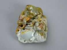 A 5 cms CARVED JADE PENDANT depicting a rabbit amongst vegetables