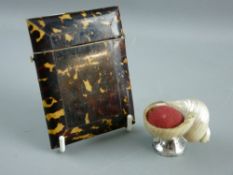 A VICTORIAN TORTOISESHELL CARD CASE and a shell form pin cushion, the hinged lid card case with push
