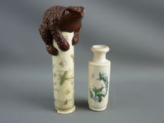 A CYLINDRICAL STAINED BONE CONTAINER and a small ivory vase, the container decorated with insects