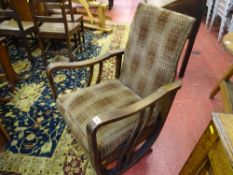 AN ART DECO OAK RECLINING ARMCHAIR, the seat and back in original upholstery, 94 cms high, 55 cms