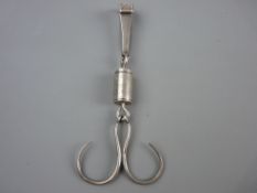 AN UNUSUAL VINTAGE BELT CLIP having a seal stamp marked 'Industry' with insect motif, banded central