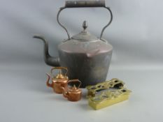 AN EXTRA LARGE GEORGIAN COPPER KETTLE with acorn knop (requiring cleaning) accompanied by two