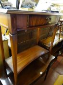 Mahogany serpentine hall table on tapered supports and with centre drawer