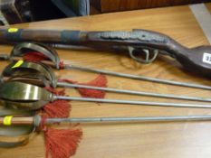 Decorative musket and foils