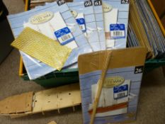 Crate containing the series of 'Building the Cutty Sark' publications, wrapped and with components