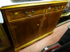 Yew wood compact two drawer sideboard