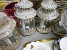 Set of four rustic lanterns