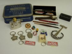 Small tin of collectables including pens and pencils, a 'Present from Rhyl' papier mache snuffbox