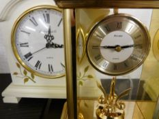 Boule type mantel clock and another modern mantel clock
