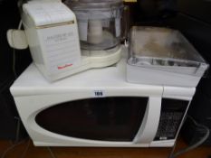 White microwave oven and a Moulinex Masterchef 450 food processor E/T