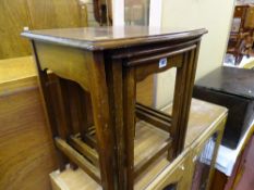 Polished wooden nest of three tables