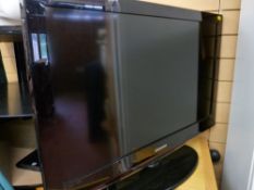 Samsung flatscreen TV and stand E/T
