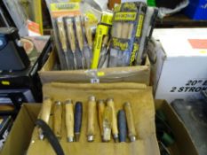 Box of hand chisels, roll of hand chisels etc