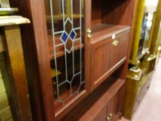 Dark wood effect glazed door lounge unit