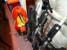Vehicle bicycle carrying equipment and a red and blue child's seat for bicycles etc