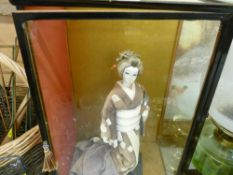 Glass cased Geisha girl doll