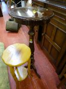 Light wood two tier planter stand and a wooden planter stand with turned centre column and triple