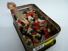 Vintage tin containing a collection of vintage cake decorations etc