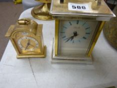 Carriage clock and a smaller heavy Tempus Fugit bedroom clock