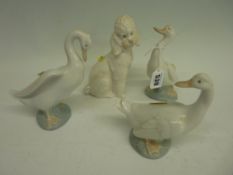 Four Nao porcelain figurines of three geese and a poodle
