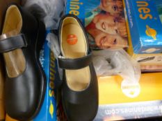 Eighteen pairs of boxed black Andanines shoes for children