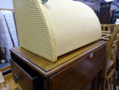Polished wooden trolley with drawer and a loom style corner basket