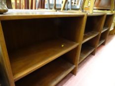 Pair of six section low dark wood bookcases
