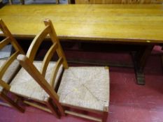 Refectory style table and six rush seated chairs