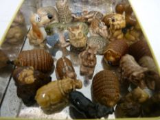 Vintage tin containing a collection of Wade Whimsies