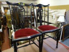 Pair of black lyre and spindlebacked upholstered chairs