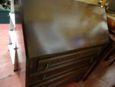 Polished wood bureau with four drawer front