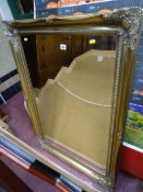 Gilt framed bevelled edge mirror