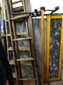 Wooden vintage stepladder and a two section ladder along with a wooden bench with cast floral