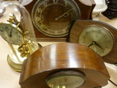 Four mantel clocks