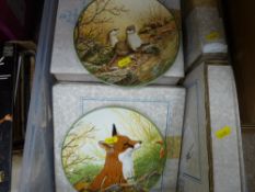 Tub of Bradford Exchange Royal Doulton collector's plates, boxed