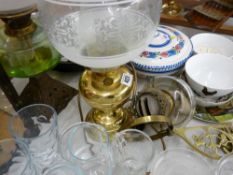 Iron based oil lamp with green glass reservoir, a brass effect oil lamp and a brass wall light