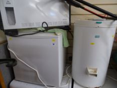 Countertop fridge, a portable electric heater and a Creda spin dryer E/T