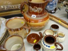 Two sporting tankards, quantity of Torquay ware and a large sporting jug