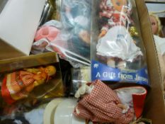 Two boxes of mixed tourist and vintage dolls