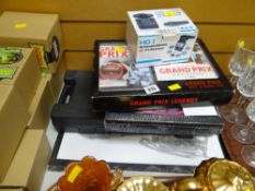 Mixed parcel of items including hand weights, boxed wall clock, Grand Prix Legends DVD & book etc