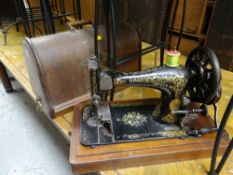 A vintage cased Singer sewing machine