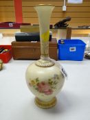 A Royal Worcester 'Blush Ivory' vase together with similar small twin-handled vase