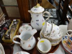 A Meissen floral decorated teaset including lidded coffee pot & sugar bowl
