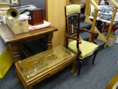 A vintage carved Oriental topped coffee table together with a continental mahogany cushioned